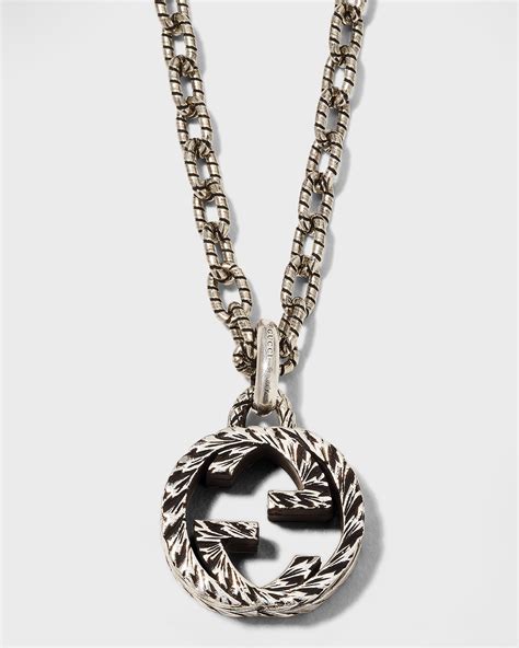 gucci interlocking g silver pendant.